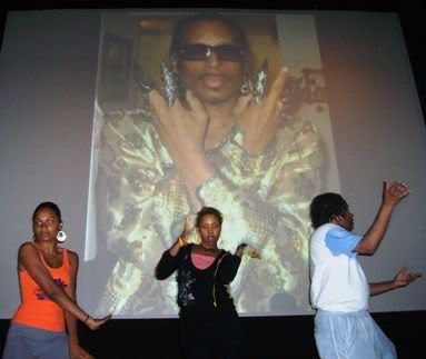Dancers from the House of Ninja performed before the screening of the documentary, 'How Do I Look' at the Anthology Film Archives; in the background is an image of Willi Ninja.