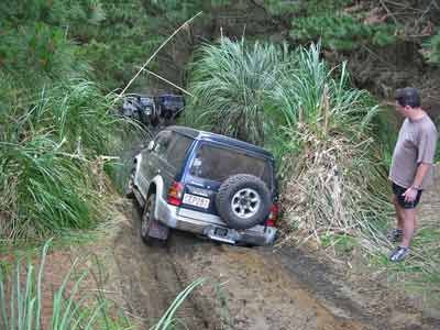 A large hole where many vehicles lifted wheels high into the air.