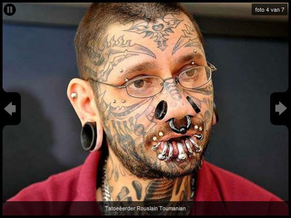 Holy hell at the tattoo artist: This guy's obviously got issues.