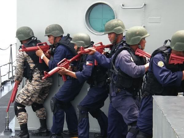  ... team conduct a mock boarding of the patrol ship BRP Artemio Recarte