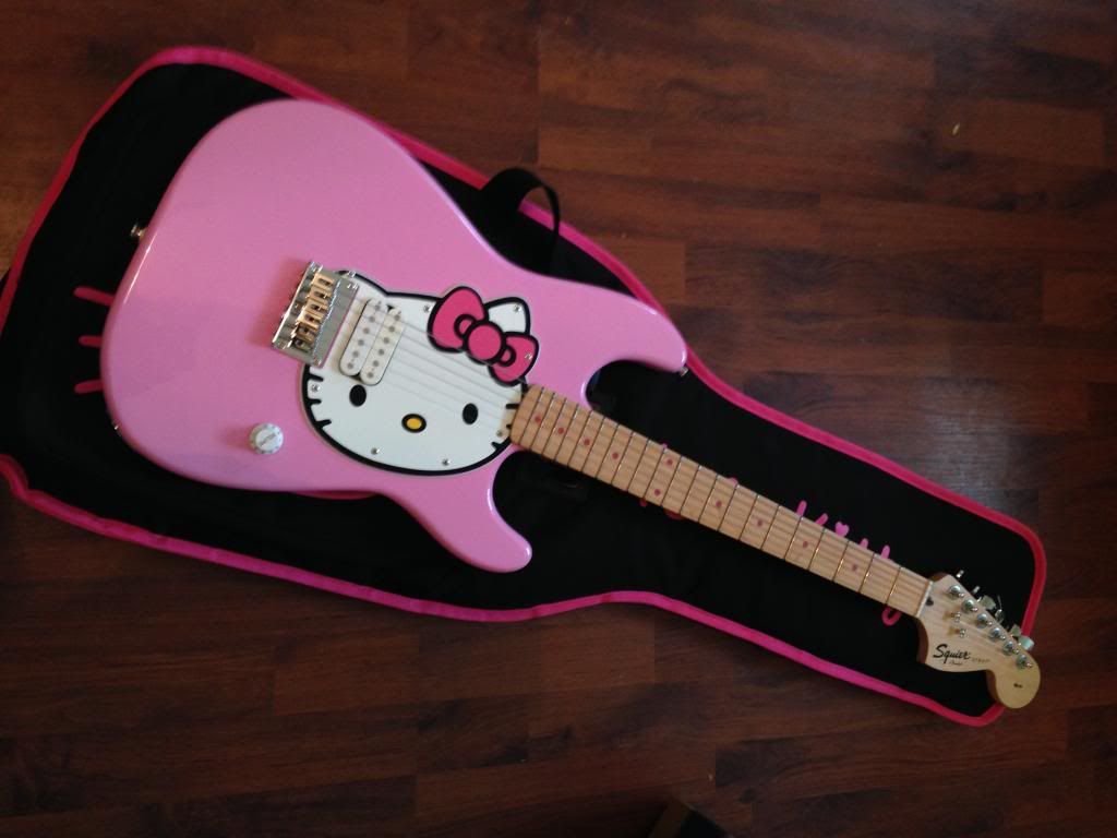 The Pink Hello Kitty Squier Strat NOS with Hello Kitty Gig Bag My